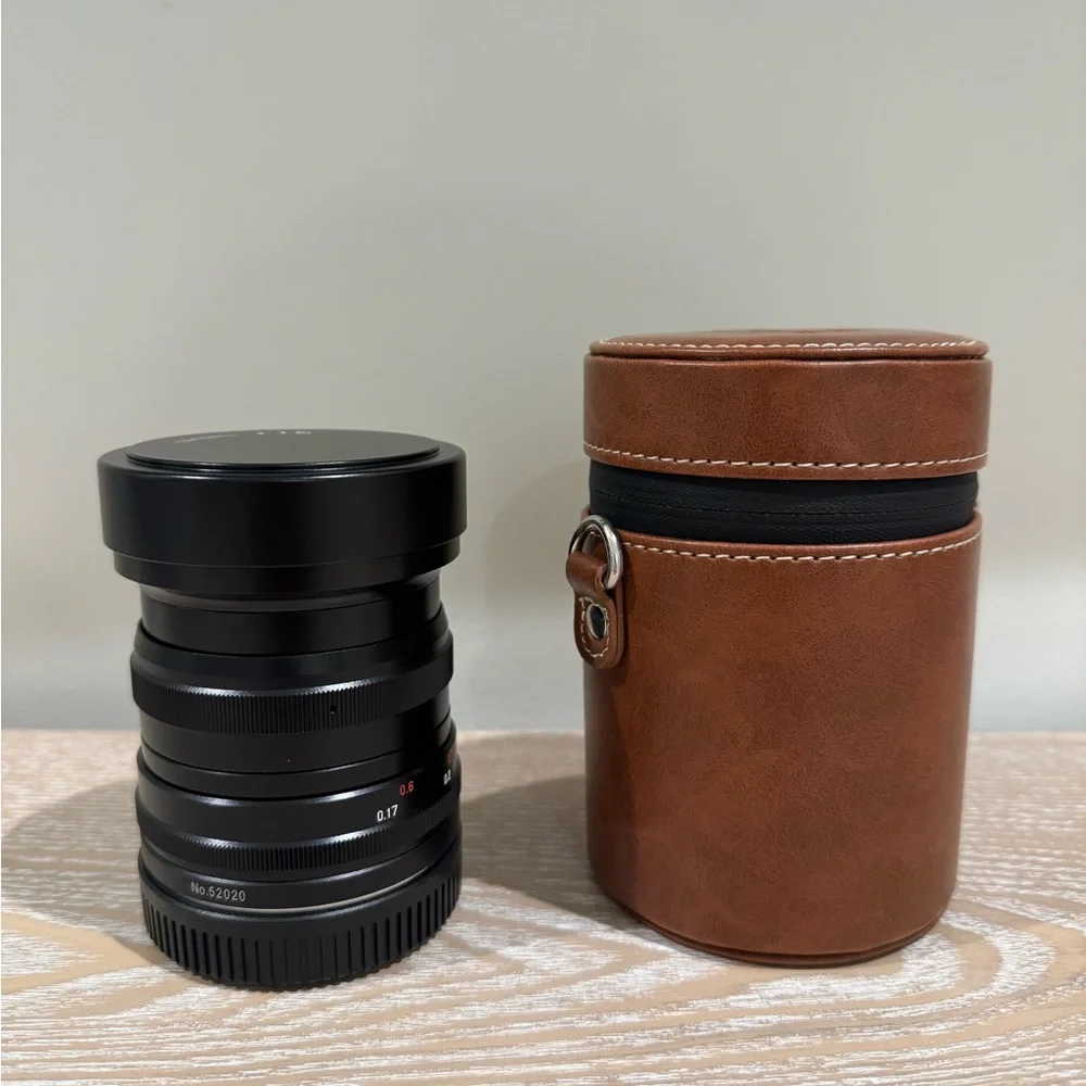 Black Camera Lens with Brown Case